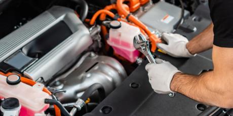mechanic-inspecting-car-engine.jpg