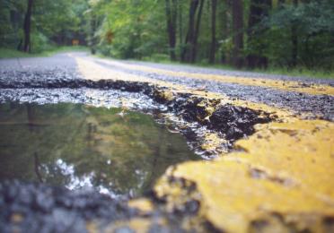 to maintain a healthy car suspension & steering system, avoid slamming into a pothole